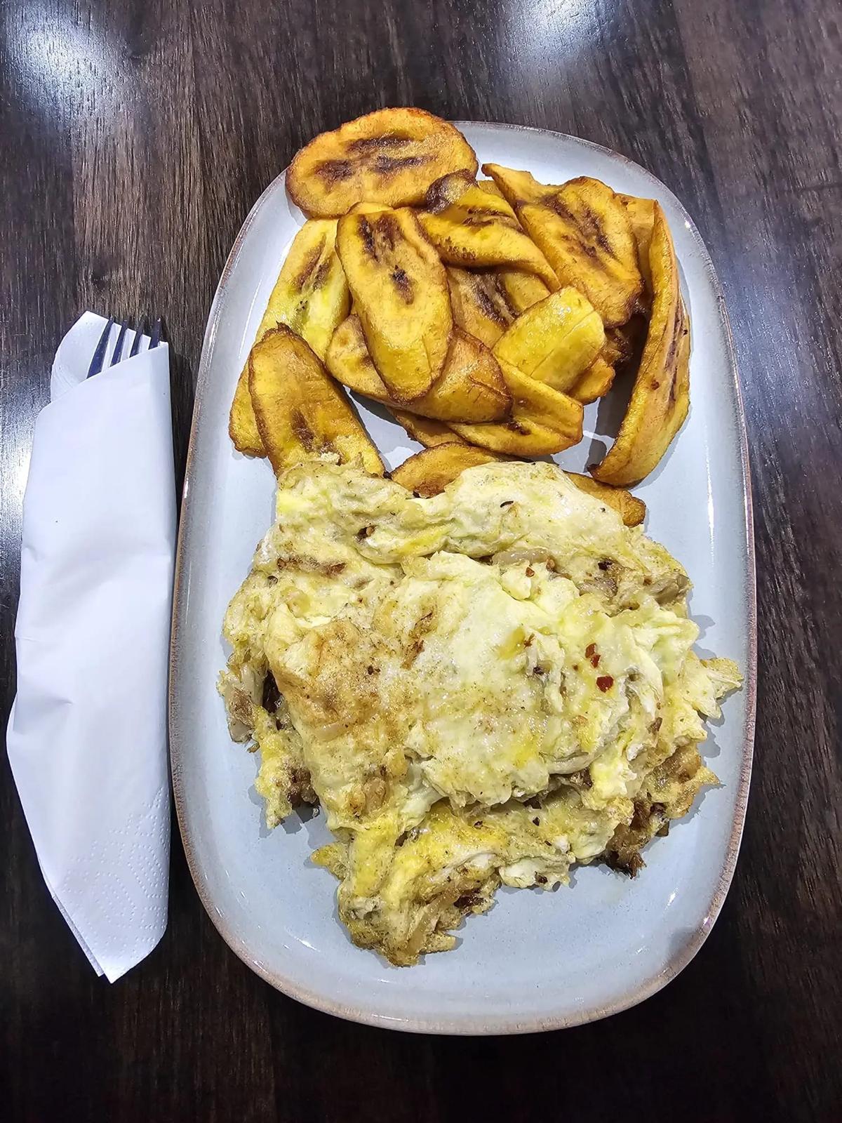 Fried plantain with egg sauce — breakfast