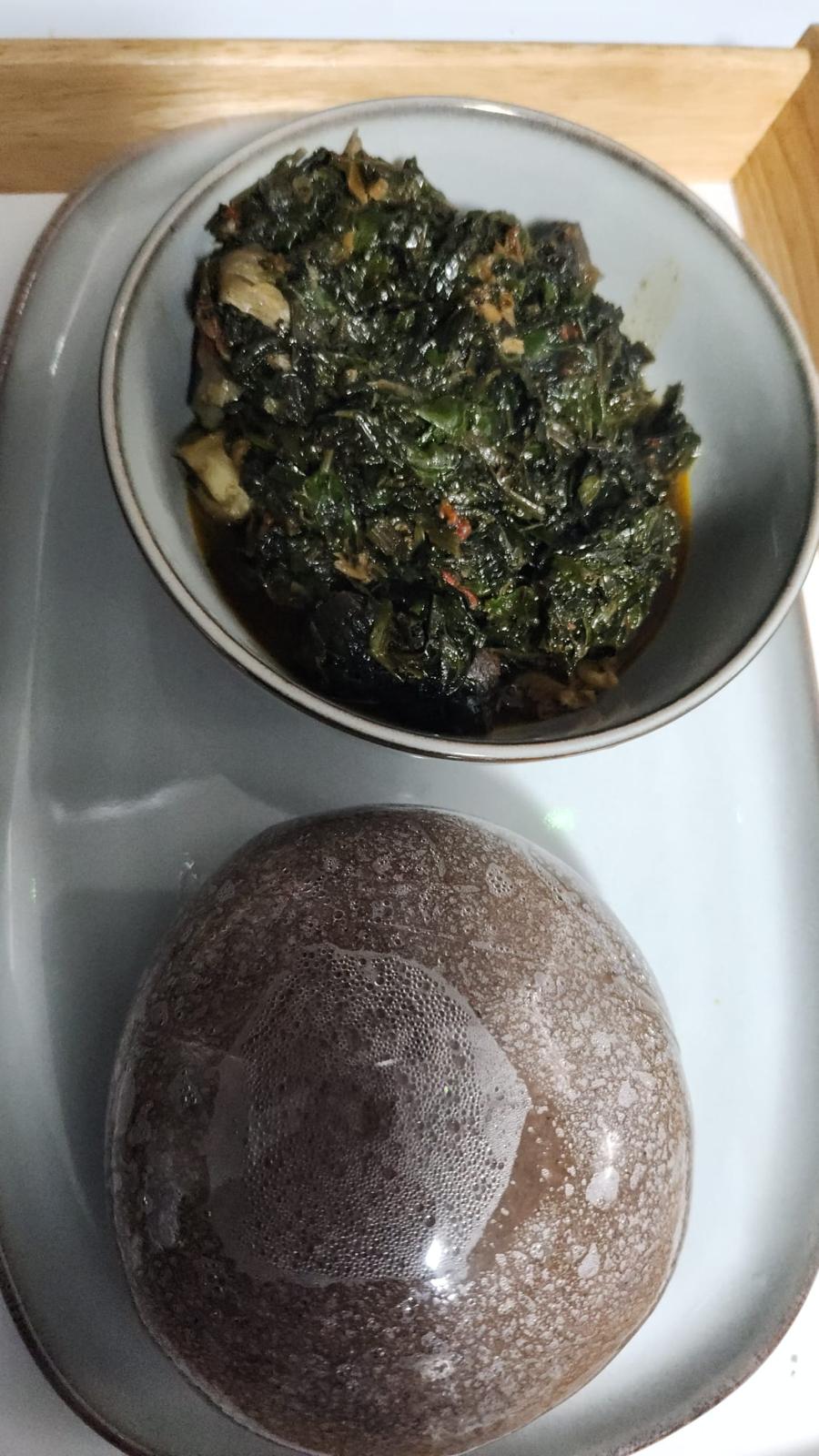 Vegetable soup with amala swallow